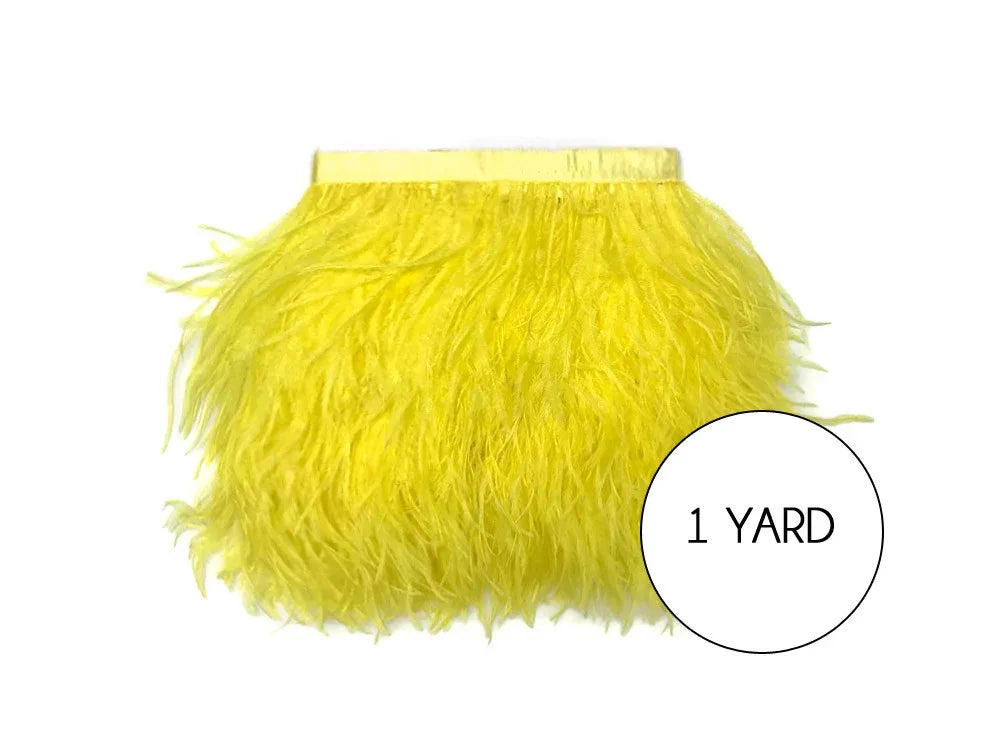 One yard of vibrant yellow ostrich feather trim for fashion and DIY crafts.