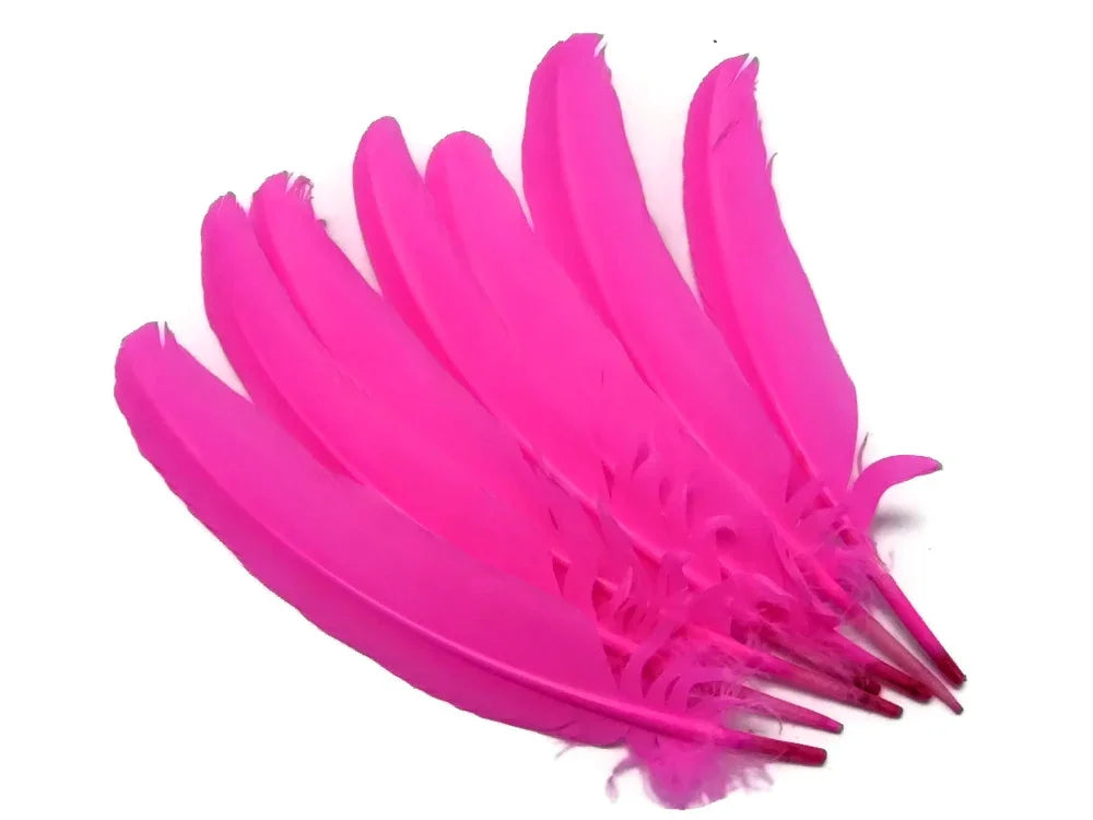 Vibrant pink feathers for DIY crafts, fashion accessories, and costume décor.