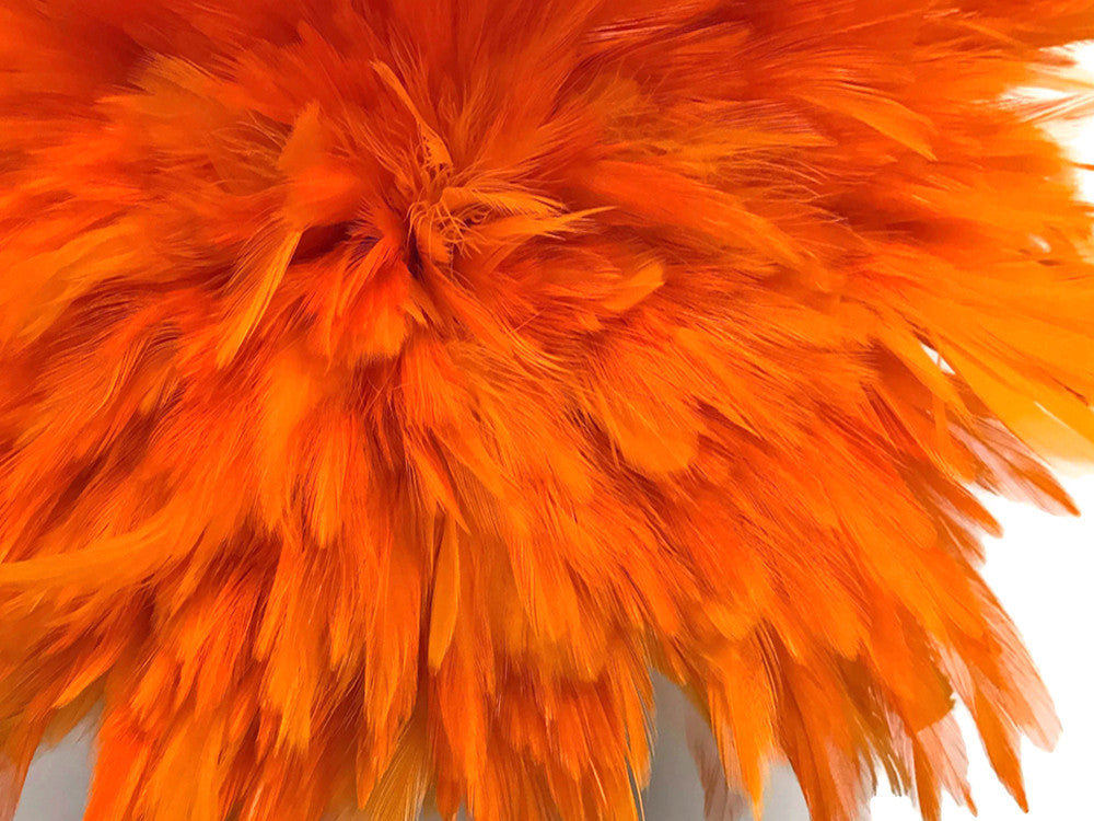 4 Inch Strip – 4-6” Dyed Orange Strung Chinese Rooster Saddle Feathers 