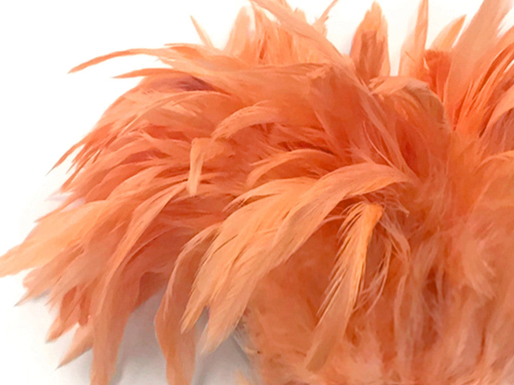 4 Inch Strip - Peach Bleached & Dyed Strung Rooster Schlappen Feathers