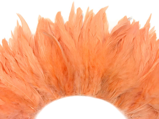 4 Inch Strip - Peach Bleached & Dyed Strung Rooster Schlappen Feathers