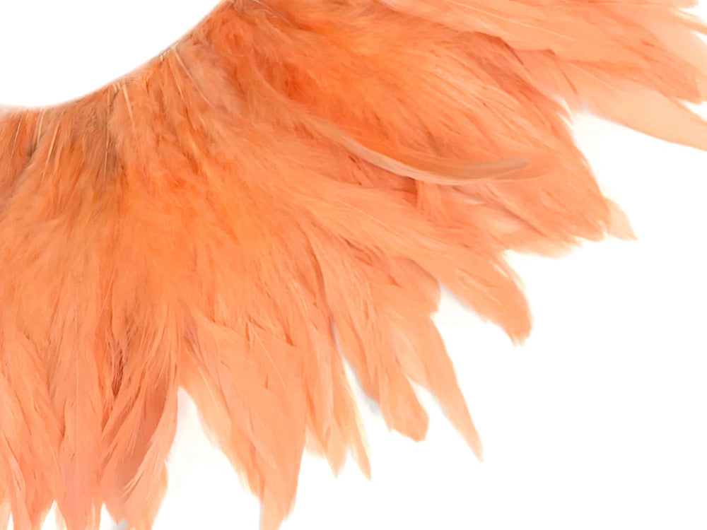 4 Inch Strip - Peach Bleached & Dyed Strung Rooster Schlappen Feathers