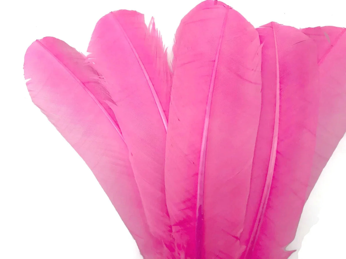 Vibrant pink feathers for DIY crafts, fashion, and decorative accessories.