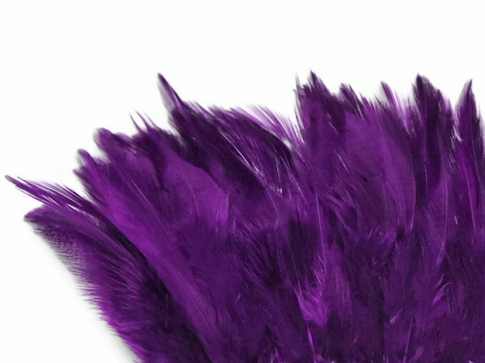 4 Inch Strip – 4-6” Dyed Purple Strung Chinese Rooster Saddle Feathers 