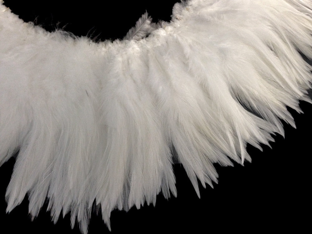 4 Inch Strip – 6-7” Natural White Strung Chinese Rooster Saddle Feathers