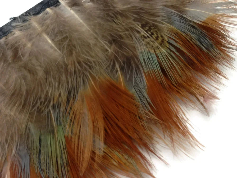 Natural brown and orange decorative feathers for crafts and fashion DIY supplies.